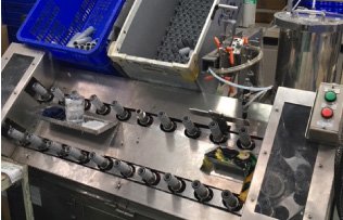 Automatic drain hose bonder